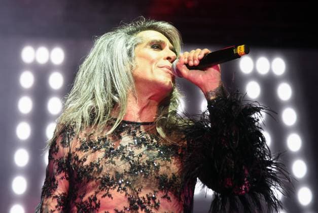 August 8, 2023, Sitges, Spain: Singer Mario Vaquerizo of Nancys Rubias performs at the Festival Jardins de terramar in Sitges. The Spanish group Nancys Rubias performed at the Festival Jardins de Terramar in Sitges in front of 2,500 people..Nancys Rubias is a glam and electronic pop group formed by the versatile artist and husband of the singer Alaska from the group Fangoria, Mario Vaquerizo singer, his sister Marta Vaquerizo drums, Miguel Balanzategui keyboards and Pedro del Moral Guitar. Sitges Spain - ZUMAs197 20230808_aaa_s197_002 Copyright: xRamonxCostax
