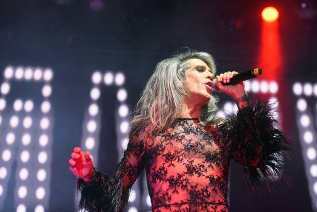 August 8, 2023, Sitges, Spain: Singer Mario Vaquerizo of Nancys Rubias performs at the Festival Jardins de terramar in Sitges. The Spanish group Nancys Rubias performed at the Festival Jardins de Terramar in Sitges in front of 2,500 people..Nancys Rubias is a glam and electronic pop group formed by the versatile artist and husband of the singer Alaska from the group Fangoria, Mario Vaquerizo singer, his sister Marta Vaquerizo drums, Miguel Balanzategui keyboards and Pedro del Moral Guitar. Sitges Spain - ZUMAs197 20230808_aaa_s197_004 Copyright: xRamonxCostax