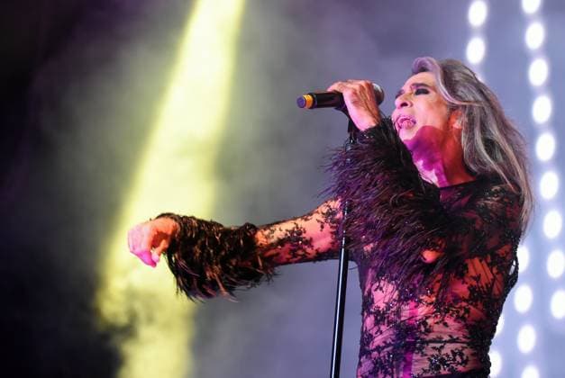 August 8, 2023, Sitges, Spain: Singer Mario Vaquerizo of Nancys Rubias performs at the Festival Jardins de terramar in Sitges. The Spanish group Nancys Rubias performed at the Festival Jardins de Terramar in Sitges in front of 2,500 people..Nancys Rubias is a glam and electronic pop group formed by the versatile artist and husband of the singer Alaska from the group Fangoria, Mario Vaquerizo singer, his sister Marta Vaquerizo drums, Miguel Balanzategui keyboards and Pedro del Moral Guitar. Sitges Spain - ZUMAs197 20230808_aaa_s197_008 Copyright: xRamonxCostax
