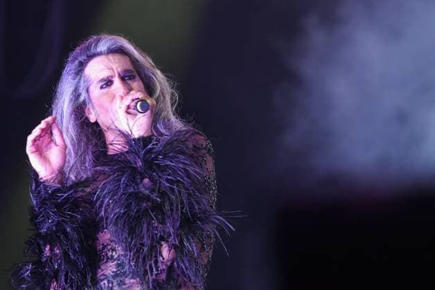 August 8, 2023, Sitges, Spain: Singer Mario Vaquerizo of Nancys Rubias performs at the Festival Jardins de terramar in Sitges. The Spanish group Nancys Rubias performed at the Festival Jardins de Terramar in Sitges in front of 2,500 people..Nancys Rubias is a glam and electronic pop group formed by the versatile artist and husband of the singer Alaska from the group Fangoria, Mario Vaquerizo singer, his sister Marta Vaquerizo drums, Miguel Balanzategui keyboards and Pedro del Moral Guitar. Sitges Spain - ZUMAs197 20230808_aaa_s197_009 Copyright: xRamonxCostax
