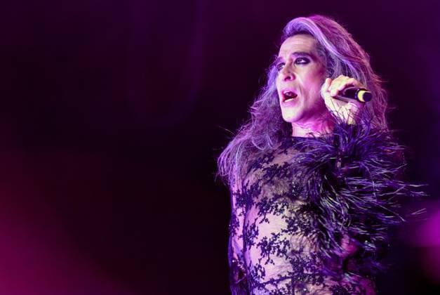 August 8, 2023, Sitges, Spain: Singer Mario Vaquerizo of Nancys Rubias performs at the Festival Jardins de terramar in Sitges. The Spanish group Nancys Rubias performed at the Festival Jardins de Terramar in Sitges in front of 2,500 people..Nancys Rubias is a glam and electronic pop group formed by the versatile artist and husband of the singer Alaska from the group Fangoria, Mario Vaquerizo singer, his sister Marta Vaquerizo drums, Miguel Balanzategui keyboards and Pedro del Moral Guitar. Sitges Spain - ZUMAs197 20230808_aaa_s197_012 Copyright: xRamonxCostax
