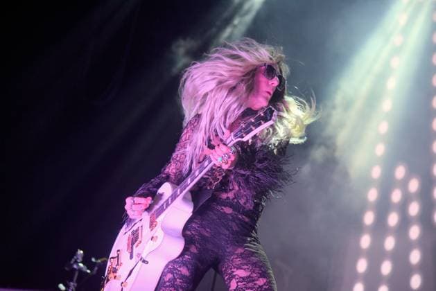 August 8, 2023, Sitges, Spain: Guitarist Juan Pedro del Moral of Nancys Rubias performs at the Jardins de terramar Festival in Sitges. The Spanish group Nancys Rubias performed at the Festival Jardins de Terramar in Sitges in front of 2,500 people..Nancys Rubias is a glam and electronic pop group formed by the versatile artist and husband of the singer Alaska from the group Fangoria, Mario Vaquerizo singer, his sister Marta Vaquerizo drums, Miguel Balanzategui keyboards and Pedro del Moral Guitar. Sitges Spain - ZUMAs197 20230808_aaa_s197_015 Copyright: xRamonxCostax