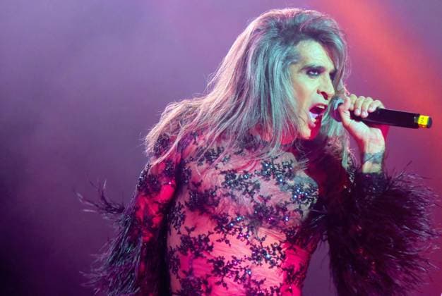 August 8, 2023, Sitges, Spain: Singer MARIO VAQUERIZO of Nancys Rubias performs at the Festival Jardins de terramar in Sitges. The Spanish group Nancys Rubias performed at the Festival Jardins de Terramar in Sitges in front of 2,500 people. Nancys Rubias is a glam and electronic pop group formed by the versatile artist and husband of the singer Alaska from the group Fangoria, Mario Vaquerizo singer, his sister Marta Vaquerizo drums, Miguel Balanzategui keyboards and Pedro del Moral Guitar. Sitges Spain - ZUMAs197 20230808_aaa_s197_013 Copyright: xRamonxCostax