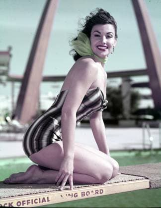 Circa 1950, Hollywood, California, USA: Ester Williams sitting on a diving board poolside: Hollywood United States - ZUMAk09_ 19520201_kaa_k09_149 Copyright: xKeystonexPressxAgencyx