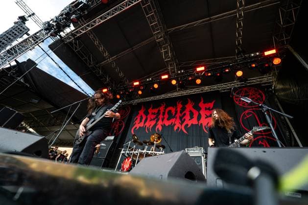 Glen Benton, left, singer and bass guitarist of American music band Deicide, performs during the final day of the Brutal Assault music festival focused on metal, on August 12, 2023, at the Josefov Fortress in Jaromer, Czech Republic. (CTKxPhoto DavidxTanecek) CTKPhotoP2023081205231  CTKPhotoP2023081205231