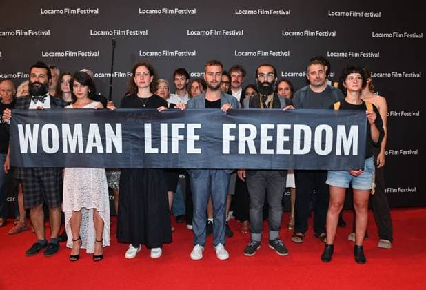 Locarno Film Festival, Preisträger Locarno,Swiss Locarno Film Festival 2023 red carpet Locarno,Swiss Locarno Film Festival 2023 Red carpet photocall Award 2023 photocall Golden Leopard 2023 best film Mantagheye bohrani (Critical Zone) by Ali Ahmadzadeh during the closing evening of the festival on the red carpet with winners of the various sections and the Iranian actress Zar Amir Ebrahimi In the photo: Sina Ataeian Dena producer with Iranian Zar Amir Ebrahimi and other winners of Leopards 2023 Locarno Swiss -  Copyright: xIPA ABACAx BRIPA20230812_262 IPA ABACAx BRIPA20230812_262