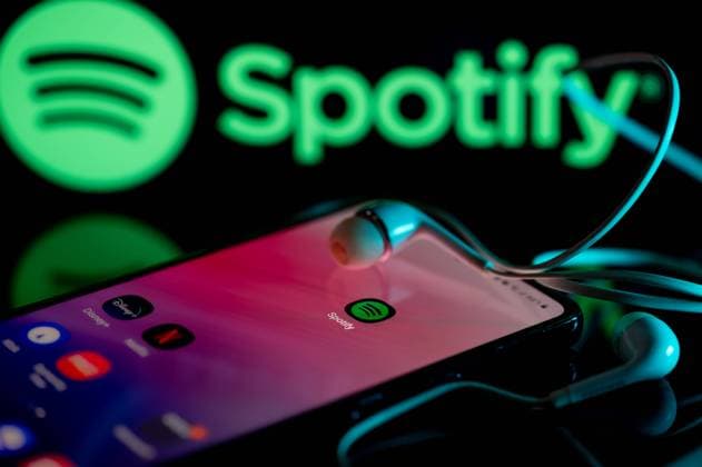 Photo Illustration Spotify Spotify logo displayed on a smart phone with Spotify seen on screen, in this photo illustration, on 15 August 2023 Brussels, Belgium. (Photo Illustration by Jonathan Raa NurPhoto) Brussels Belgium  Copyright: xJonathanxRaax originalFilename: raa-spotifyp230815_npXHy.jpg