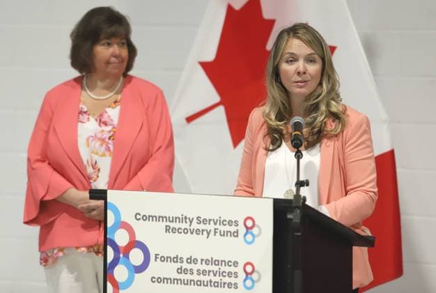 August 17, 2023, Ottawa, ON, Canada: Minister of Families, Children and Social Development, Jenna Sudds, right, and Anita Vandenbeld, Member of Parliament for Ottawa West-Nepean, make an announcement about the Community Services Recovery Fund to help organizations in their post-pandemic recovery at the Boys and Girls Club in Ottawa on Thursday, August 17, 2023. Ottawa Canada - ZUMAc35_ 20230817_zaf_c35_010 Copyright: xPatrickxDoylex