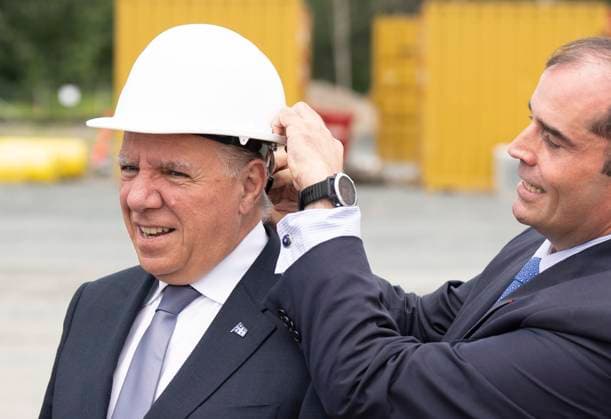 August 17, 2023, BECANCOUR, PQ, Canada: Quebec Premier Francois Legault has his hard hat adjusted as he arrives to break ground on the construction site of the new Ford manufacturing plant in Becancour, Que., Thursday, Aug.17, 2023. BECANCOUR Canada  - ZUMAc35_ 20230817_zaf_c35_029 Copyright: xChristinnexMuschix