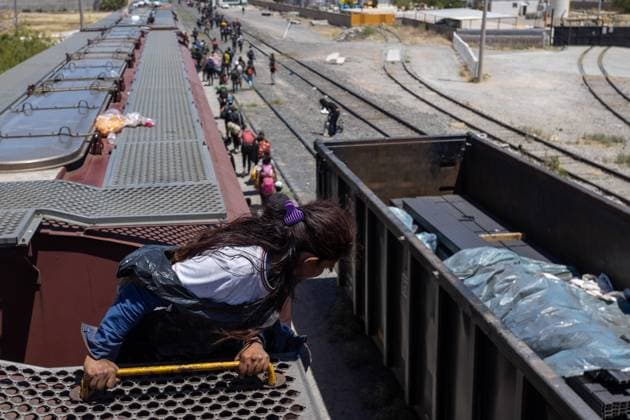 May 7, 2023, Auburn Hills, Michigan, USA: Every day, thousands of migrants arrive at the border between Mexico and the United States aboard a freight train they board in Mexico City. The train, known as La Bestia, has become one of the most frequently used modes of transportation by migrants due to its affordability. However, behind this quest for opportunities and hope, there are also heart-wrenching consequences: many individuals have suffered the loss of limbs, and in tragic cases, some have even lost their lives in the attempt. Auburn Hills USA - ZUMAp241 20230507_zip_p241_011 Copyright: xDavidxPeinadox
