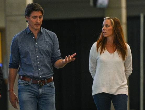 PM Trudeau Visits Wildfire Evacuees In Edmonton EDMONTON, CANADA - AUGUST 18, 2023: Canadian PM Justin Trudeau and MLA Caroline Wawzonek seen at Edmonton s Expo Center transformed into the Emergency Response Center in Edmonton, on August 18, 2023, in Edmonton s Expo Center, Edmonton, Canada. PM Trudeau visited wildfire evacuees from the Northwest Territories. The Edmonton hub helped 974 residents and 60 animals by providing essentials. PM Trudeau highlighted community resilience amid home concerns and thanked Canadians for unprecedented summer support during fires and floods, highlighting responsive and compassionate individuals, while pledging federal coordination with British Columbia wildfires. Edmonton Canada  Copyright: xArturxWidakx originalFilename: widak-pmtrudea230818_np2pe.jpg