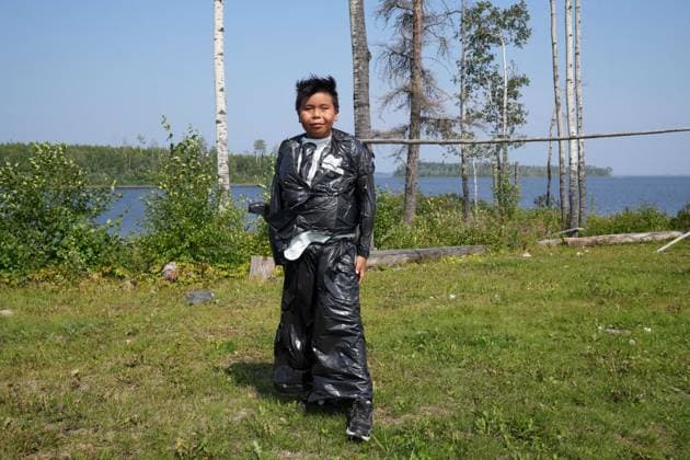 August 18, 2023, NESKANTAGA, ON, CAN: Nine year old Dayton Sugarhead poses for a photo as he enters the ages ten and under formal wear contest during the Neskantaga First Nation Summer Festival, in Neskantaga, Ont., Friday, Aug. 18, 2023. NESKANTAGA CAN  - ZUMAc35_ 20230818_zaf_c35_093 Copyright: xChrisxYoungx