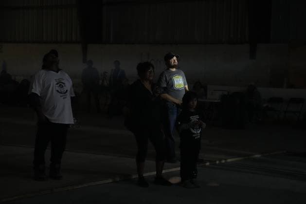 August 18, 2023, NESKANTAGA, ON, CAN: People gather to watch the band Harlequin during the Neskantaga First Nation Summer Festival, in Neskantaga, Ont., Thursday, Aug. 17, 2023. NESKANTAGA CAN  - ZUMAc35_ 20230818_zaf_c35_103 Copyright: xChrisxYoungx