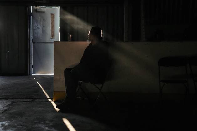 August 18, 2023, NESKANTAGA, ON, CAN: Community member Alex Moonias at the back of the arena as people watch the band Harlequin during the Neskantaga First Nation Summer Festival, in Neskantaga, Ont., Thursday, Aug. 17, 2023. NESKANTAGA CAN  - ZUMAc35_ 20230818_zaf_c35_105 Copyright: xChrisxYoungx