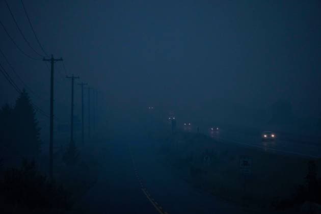 August 20, 2023, KAMLOOPS, BC, CANADA: Thick smoke from wildfires burning in the area hangs in the air as motorists travel on the Trans-Canada Highway east of Kamloops, B.C., on Sunday, August 20, 2023. KAMLOOPS CANADA  - ZUMAc35_ 20230820_zaf_c35_158 Copyright: xDarrylxDyckx
