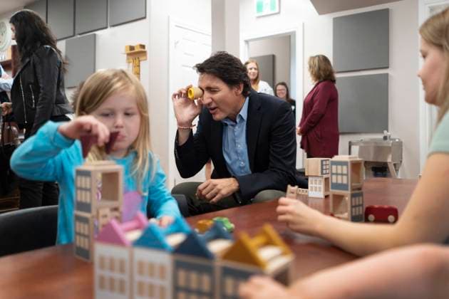 August 21, 2023, Cornwall, PEI, Canada: Prime Minister Justin Trudeau plays with children before an announcement at the Island Montessori Academy in Cornwall, P.E.I., Monday, Aug. 21, 2023. Cornwall Canada  - ZUMAc35_ 20230821_zaf_c35_021 Copyright: xDarrenxCalabresex