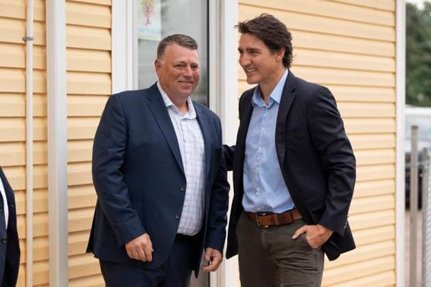 August 21, 2023, Cornwall, PEI, Canada: Prime Minister Justin Trudeau, right, is greeted by Dennis King, Premier of Prince Edward Island, before an announcement at the Island Montessori Academy in Cornwall, P.E.I., Monday, Aug. 21, 2023. Cornwall Canada - ZUMAc35_ 20230821_zaf_c35_024 Copyright: xDarrenxCalabresex