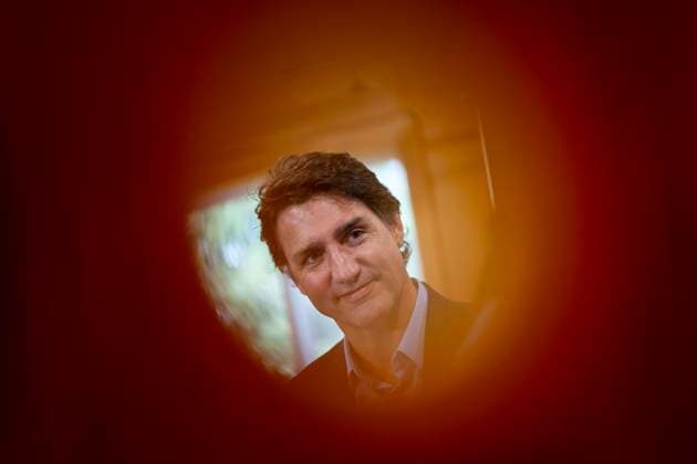 August 21, 2023, Cornwall, PEI, Canada: Prime Minister Justin Trudeau is seen through a child s toy prior to an announcement at the Island Montessori Academy in Cornwall, P.E.I., Monday, Aug. 21, 2023. Cornwall Canada  - ZUMAc35_ 20230821_zaf_c35_031 Copyright: xDarrenxCalabresex