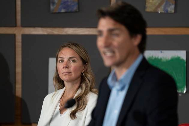 August 21, 2023, Cornwall, PEI, Canada: Jenna Sudds, Minister of Families, Children and Social Development, looks on as Prime Minister Justin Trudeau makes an announcement at the Island Montessori Academy in Cornwall, P.E.I., Monday, Aug. 21, 2023. Cornwall Canada - ZUMAc35_ 20230821_zaf_c35_032 Copyright: xDarrenxCalabresex