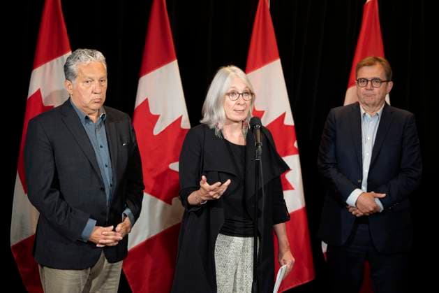 August 22, 2023, Charlottetown, PEI, Canada: Minister of Indigenous Services Patty Hajdu, centre, speaks to reporters as Minister of Northern Affairs Dan Vandal, left, and Minister of Energy and Natural Resources Jonathan Wilkinson look on during the Liberal Cabinet retreat in Charlottetown, P.E.I. on Tuesday, August 22, 2023. Charlottetown Canada - ZUMAc35_ 20230822_zaf_c35_011 Copyright: xDarrenxCalabresex