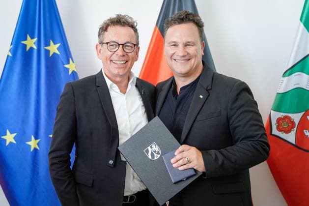 Award of the Order of Merit of the State of North Rhine Westphalia Guido Maria Kretschmer from Hamburg the fashion designer and popular presenter with his just presented Order of Merit and his husband Frank Mutters following the award of the Order of Merit of the State of North Rhine Westphalia in the State Chancellery in Duesseldorf, Dü