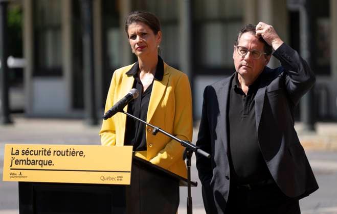 August 22, 2023, MONTREAL, PQ, Canada: Deputy Premier and Minister of Transport and Sustainable Mobility Genevieve Guilbault, left and Quebec Education Minister Bernard Drainville, answer questions from the media during a press conference about new road safety measures, in Montreal, Tuesday, Aug. 22, 2023. MONTREAL Canada - ZUMAc35_ 20230822_zaf_c35_024 Copyright: xChristinnexMuschix