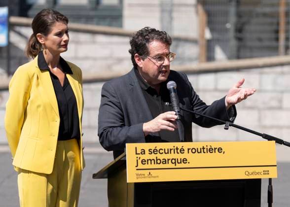 August 22, 2023, MONTREAL, PQ, Canada: Deputy Premier and Minister of Transport and Sustainable Mobility Genevieve Guilbault, left and Quebec Education Minister Bernard Drainville, answer questions from the media during a press conference about new road safety measures, in Montreal, Tuesday, Aug. 22, 2023. MONTREAL Canada - ZUMAc35_ 20230822_zaf_c35_026 Copyright: xChristinnexMuschix
