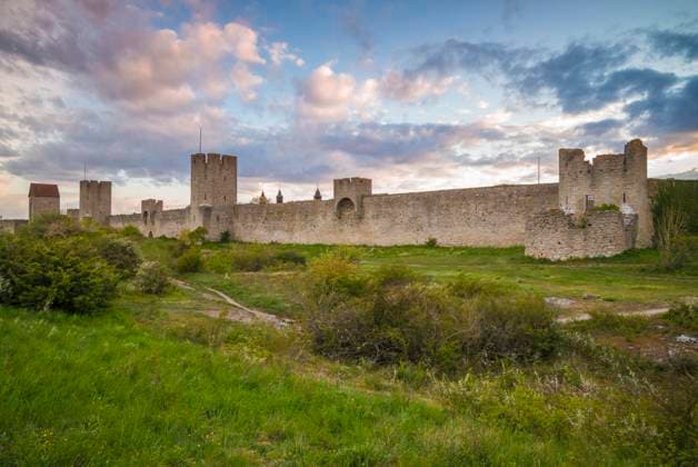 Sweden, Gotland Island, Visby, 12th century city wall, most complete medieval city wall in Europe, dusk  Copyright: xWalterxBibikowx x EU28 WBI0718