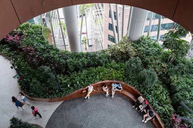 01 08 2023, Singapore, Republic of Singapore, Asia Visitors on one of four levels of the Green Oasis vertical garden in the new CapitaSpring skyscraper in the central business district at Raffles Place The building was designed by Danish architectural firm Bjarke Ingels Group BIG