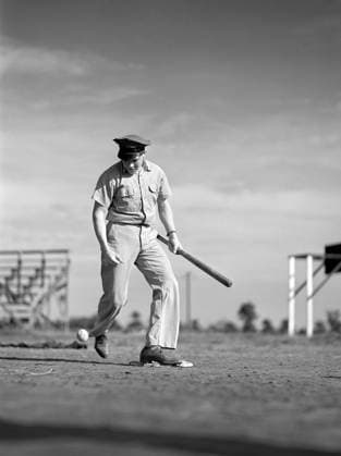 Man playing baseball, Farm Security Administration migrant labor camp, Weslaco, Texas, USA, Arthur Rothstein, U.S. Farm Security Administration, February 1942  Copyright: xCircaxImagesx ghi-circa11944
