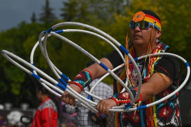 2Spirit Powwow Opens Edmonton Pride 2023 EDMONTON, CANADA - AUGUST 24, 2023: Lakota Tootoosis of the Poundmaker Cree Nation performs a hoop dance performance at the Beaver Hills 2Spirit Powwow during Edmonton s Pride Festival, on August 24, 2023, in Edmonton, Alberta, Canada. The hoop dance is a form of storytelling dance that incorporates various formations such as the butterfly, eagle, and the world, among others. As the performance unfolds, you re invited to use your imagination and witness a captivating transformation of images. Edmonton Canada Copyright: xArturxWidakx originalFilename: widak-2spiritp230824_npjfz.jpg