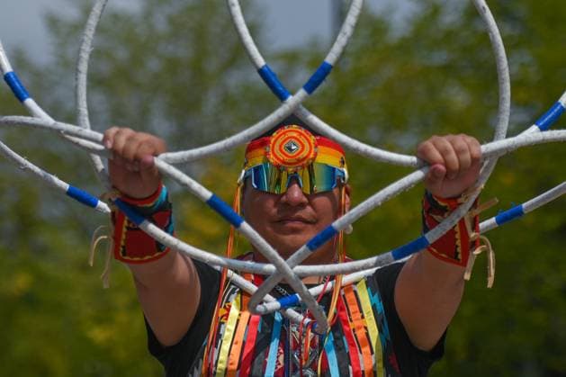 2Spirit Powwow Opens Edmonton Pride 2023 EDMONTON, CANADA - AUGUST 24, 2023: Lakota Tootoosis of the Poundmaker Cree Nation performs a hoop dance performance at the Beaver Hills 2Spirit Powwow during Edmonton s Pride Festival, on August 24, 2023, in Edmonton, Alberta, Canada. The hoop dance is a form of storytelling dance that incorporates various formations such as the butterfly, eagle, and the world, among others. As the performance unfolds, you re invited to use your imagination and witness a captivating transformation of images. Edmonton Canada Copyright: xArturxWidakx originalFilename: widak-2spiritp230824_np39T.jpg