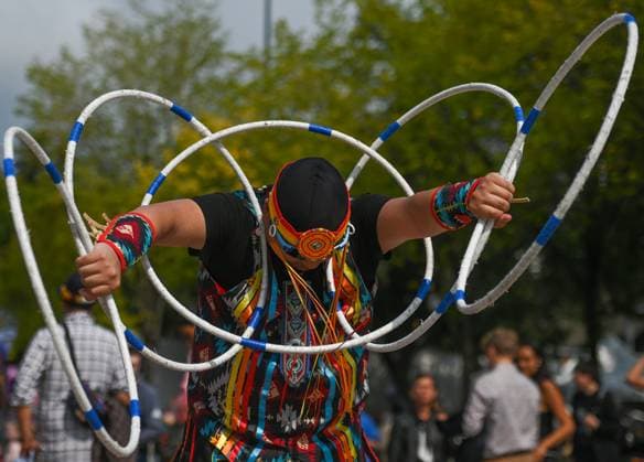 2Spirit Powwow Opens Edmonton Pride 2023 EDMONTON, CANADA - AUGUST 24, 2023: Lakota Tootoosis of the Poundmaker Cree Nation performs a hoop dance performance at the Beaver Hills 2Spirit Powwow during Edmonton s Pride Festival, on August 24, 2023, in Edmonton, Alberta, Canada. The hoop dance is a form of storytelling dance that incorporates various formations such as the butterfly, eagle, and the world, among others. As the performance unfolds, you re invited to use your imagination and witness a captivating transformation of images. Edmonton Canada Copyright: xArturxWidakx originalFilename: widak-2spiritp230824_npnc2.jpg