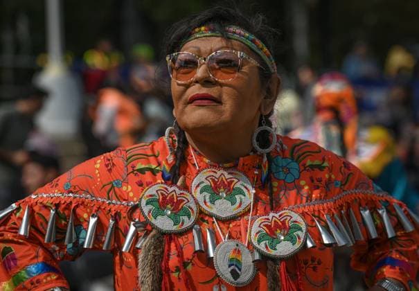 2Spirit Powwow Opens Edmonton Pride 2023 EDMONTON, CANADA - AUGUST 24, 2023: A member of the First Nation during a jingle dress competition at the Beaver Hills 2Spirit Powwow in Edmonton s Churchill Square on the opening day of the Edmonton Pride Festival, on August 24, 2023, in Edmonton, Alberta, Canada. Edmonton Canada  Copyright: xArturxWidakx originalFilename: widak-2spiritp230824_npKNN.jpg