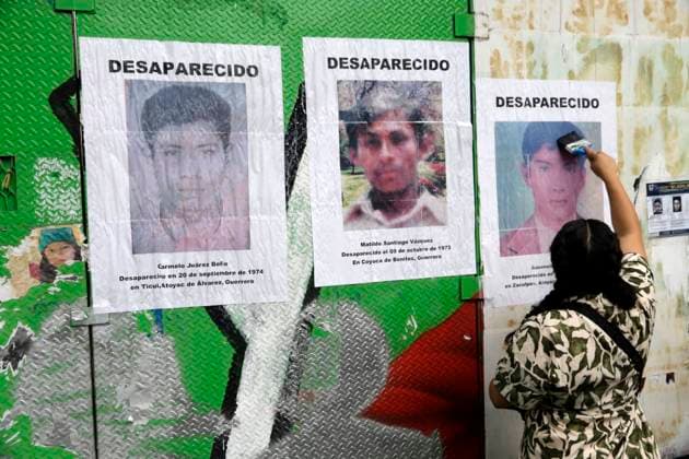 August 25, 2023, Mexico City, Mexico: Activists post photographs of victims of forced disappearance in the so-called Dirty War period in 1974 in the state of Guerrero. The protest at the Glorieta at y the Disappeared on Reforma avenue in Mexico City. on August 25, 2023 in Mexico City, Mexico Mexico City Mexico - ZUMAe321 20230825_zia_e321_008 Copyright: xLuisxBarronx