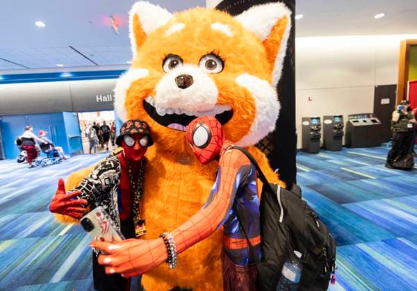 (230825) -- TORONTO, Aug. 25, 2023 -- Cosplayers pose for a selfie during the 2023 Fan Expo Canada in Toronto, Canada, on Aug. 25, 2023. As one of the largest comics, sci-fi, anime and gaming events in Canada, the annual event is held here from Aug. 24 to Aug. 27, attracting hundreds of thousands of fans from across the world. (Photo by Xinhua) CANADA-TORONTO-FAN EXPO CANADA ZouxZheng 