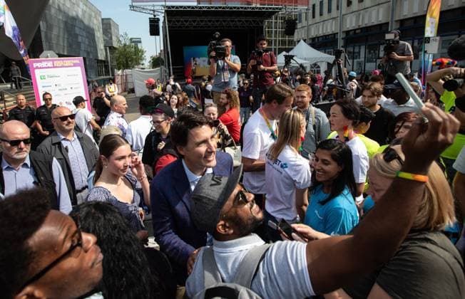 August 26, 2023, EDMONTON, AB, CANADA: Prime Minister Justin Trudeau takes photos with people while participating in a Pride event in Edmonton on Saturday, August 26, 2023. EDMONTON CANADA  - ZUMAc35_ 20230826_zaf_c35_034 Copyright: xJasonxFransonx