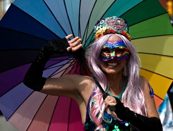 August 27, 2023, Ottawa, ON, CAN: A person wears the colours of the rainbow as they march in the Capital Pride Parade in Ottawa, on Sunday, Aug. 27, 2023. Ottawa CAN  - ZUMAc35_ 20230827_zaf_c35_034 Copyright: xJustinxTangx