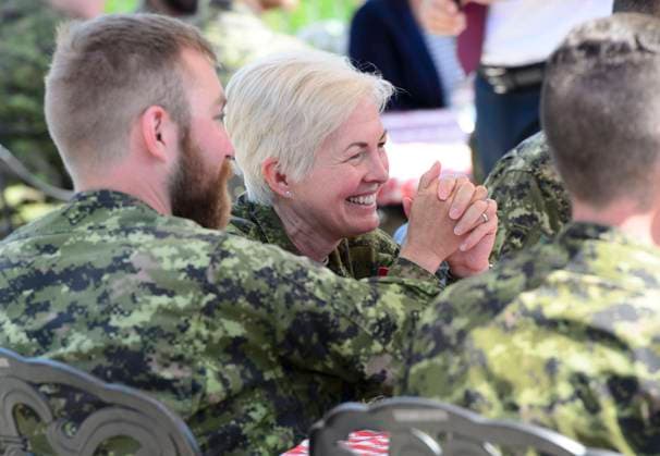 July 15, 2019, Petawawa, ON, Canada: Brigadier-General Jennie Carignan of the Canadian Armed Forces joins soldiers during a lunch with Prime Minister Justin Trudeau and Secretary General of the North Atlantic Treaty Organization (NATO) Jens Stoltenberg at Canadian Forces Base Petawawa, Ont. on July 15, 2019. The military s chief of professional conduct and culture says the Armed Forces will end its inflexible and inhuman mandatory reporting policy. Lt.-Gen. Jennie Carignan says members will still be able to report misconduct but they will no longer face possible penalties for failing to report something they experience or witness. Petawawa Canada  - ZUMAc35_ 20190715_zaf_c35_048 Copyright: xSeanxKilpatrickx