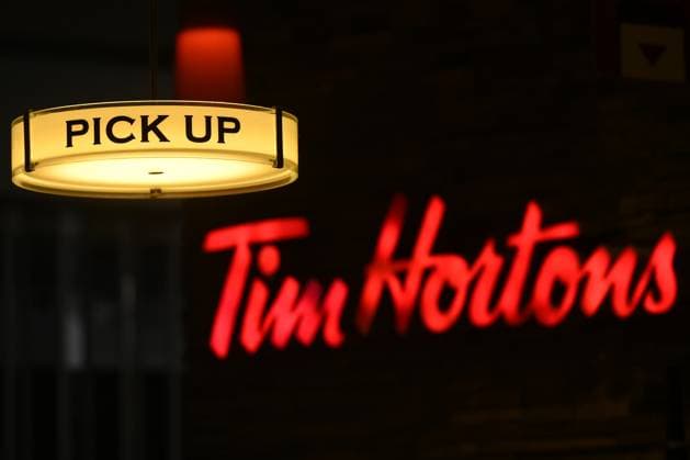 Daily Life In Edmonton EDMONTON, CANADA - AUGUST 23, 2023: Tim Hortons logo on August 23, 2023, in Edmonton, Alberta, Canada. Edmonton Canada  Copyright: xArturxWidakx originalFilename: widak-dailylif230823_np1jL.jpg
