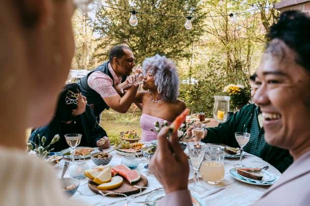 Cheerful friends of LGBTQ community enjoying during party in back yard Germany, Berlin, model released, property released Copyright: xMaskotx , MA102881 MA102881
