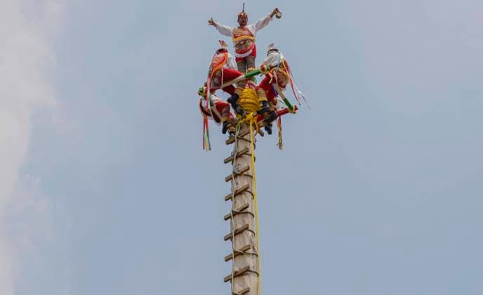 Ritual Ceremony Of Voladores Of Mexico A group of flyers from Papantla (a town belonging to the State of Veracruz, Mexico), get ready to dance on the air at the facilities of the Los Pinos Cultural Complex in Mexico City, as part of the 8th National Meeting of the Ritual Ceremony de Voladores, with the purpose of strengthening, protecting and disseminating this dance within the framework of the 14 years of the declaration of this tradition as Intangible Cultural Heritage of Humanity. The origins of the voladores ceremony date back to pre-Hispanic times. Although there is no exact date, it is known that upon the arrival of the conquerors, its main chroniclers considered this dance as a game , perhaps because originally the attire used  Copyright: xGerardoxVieyrax originalFilename: vieyra-notitle230901_npHvA.jpg