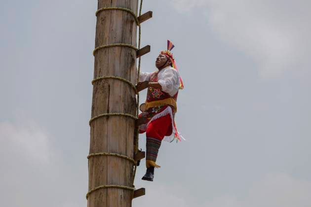 Ritual Ceremony Of Voladores Of Mexico A flyer from Papantla (a town belonging to the State of Veracruz, Mexico), climbs a pedestal to dance in the air at the facilities of the Los Pinos Cultural Complex in Mexico City, as part of the 8th National Meeting of the Ritual Ceremony of Voladores, with the purpose of strengthening, protecting and disseminating this dance within the framework of the 14 years of the declaration of this tradition as Intangible Cultural Heritage of Humanity. The origins of the voladores ceremony date back to pre-Hispanic times. Although there is no exact date, it is known that upon the arrival of the conquerors, its main chroniclers considered this dance as a game , perhaps because originally the attire used co  Copyright: xGerardoxVieyrax originalFilename: vieyra-notitle230901_npyLC.jpg