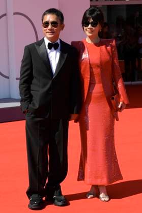 Tony Leung Chiu wai and Carina Lau Kar ling at the premiere of the documentary La parte del Leone una storia della Mostra The Lion s Share a History of the Mostra and the awarding of the Golden Lion for Lifetime Achievement to Tony Leung Chiu wai at the Biennale di Venezia 2023 80 Venice International Film Festival at Palazzo del Cinema Venice, 02 09 2023. Foto:xA.xM.xTinghinox xFuturexImagex leone_3908