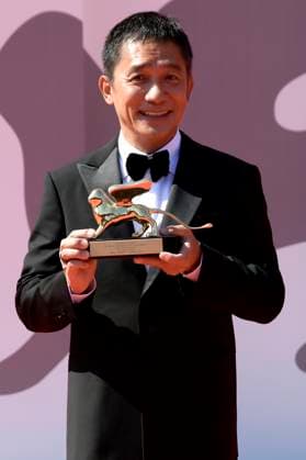 Tony Leung Chiu wai at the premiere of the documentary La parte del Leone una storia della Mostra The Lion s Share a History of the Mostra and the awarding of the Golden Lion for Lifetime Achievement to Tony Leung Chiu wai at the Biennale di Venezia 2023 80 Venice International Film Festival at Palazzo del Cinema Venice, 02 09 2023. Foto:xA.xM.xTinghinox xFuturexImagex leone_3953