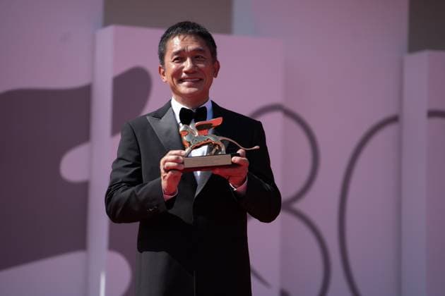 Golden Lion For Lifetime Achievement Ceremony - The 80th Venice International Film Festival Tony Leung Chiu-wai attends a red carpet for the Golden Lion For Lifetime Achievement Award & The Lion s Share: A History Of The Mostra at the 80th Venice International Film Festival on September 02, 2023 in Venice, Italy Venice Italy  Copyright: xLucaxCarlinox originalFilename: carlino-notitle230902_npoB5.jpg