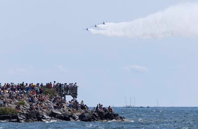 (230903) -- TORONTO, Sept. 3, 2023 -- Spectators watch the performance of the U.S. Navy Blue Angels during the 2023 Canadian International Air Show (CIAS) in Toronto, Canada, on Sept. 2, 2023. The annual show is held here from Sept. 2 to 4 this year. (Photo by Xinhua) CANADA-TORONTO-CANADIAN INT L AIR SHOW ZouxZheng 