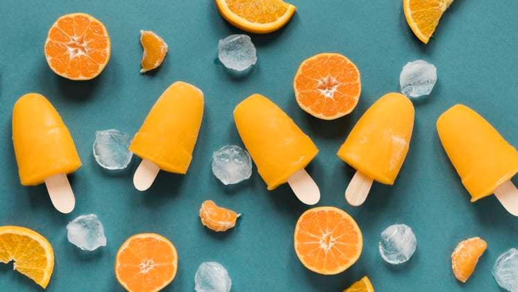  Leckeres Eis am Stiel mit Orangeneis *** tasty Ice on Stem with Orangeneis Copyright: imageBROKER/OleksandrxLatkun ibxole09570360.jpg