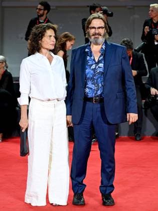 Venice, 80th Venice Film Festival 2023 - Evening 5 - red carpet Filming Italy. In the photo Giuseppe Battiston with his wife  Copyright: xManuelexMangiarottix xipa-agencyx xPoolxPhotoxEventsx02x IPA_IPA40045338