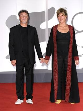 Venice, 80th Venice Film Festival 2023 - Evening 5 - red carpet Filming Italy. In the photo Giorgio Tirabassi with his wife  Copyright: xManuelexMangiarottix xipa-agencyx xPoolxPhotoxEventsx02x IPA_IPA40047518